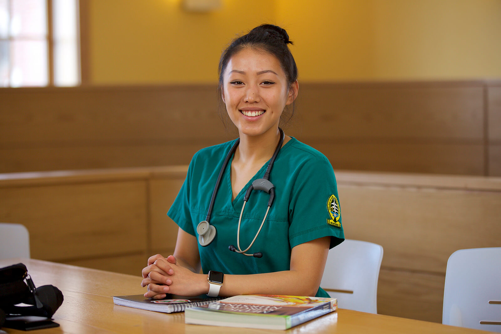 Photo of an Elms nursing student.