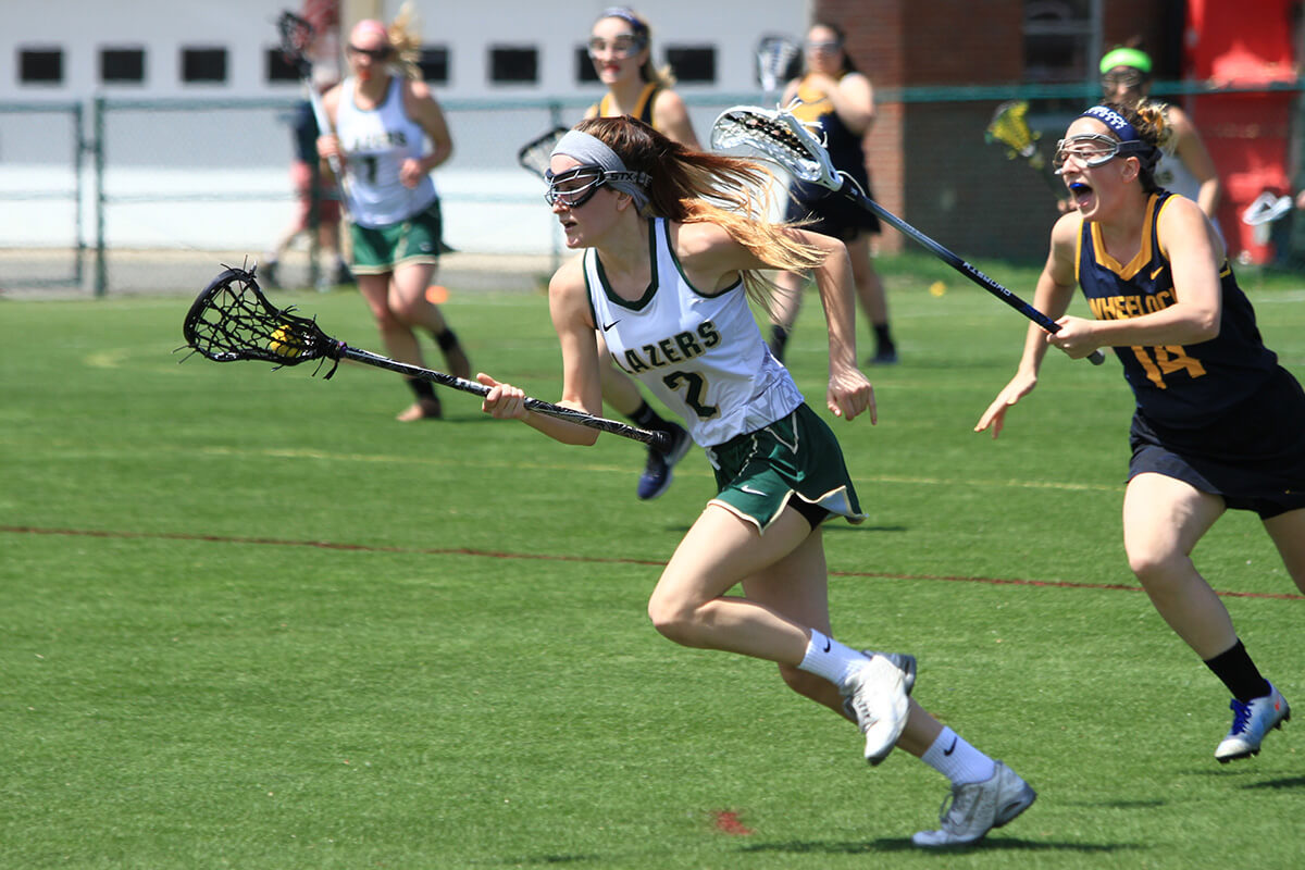 Photo of Vanessa Vurno '19 on the lacrosse field.