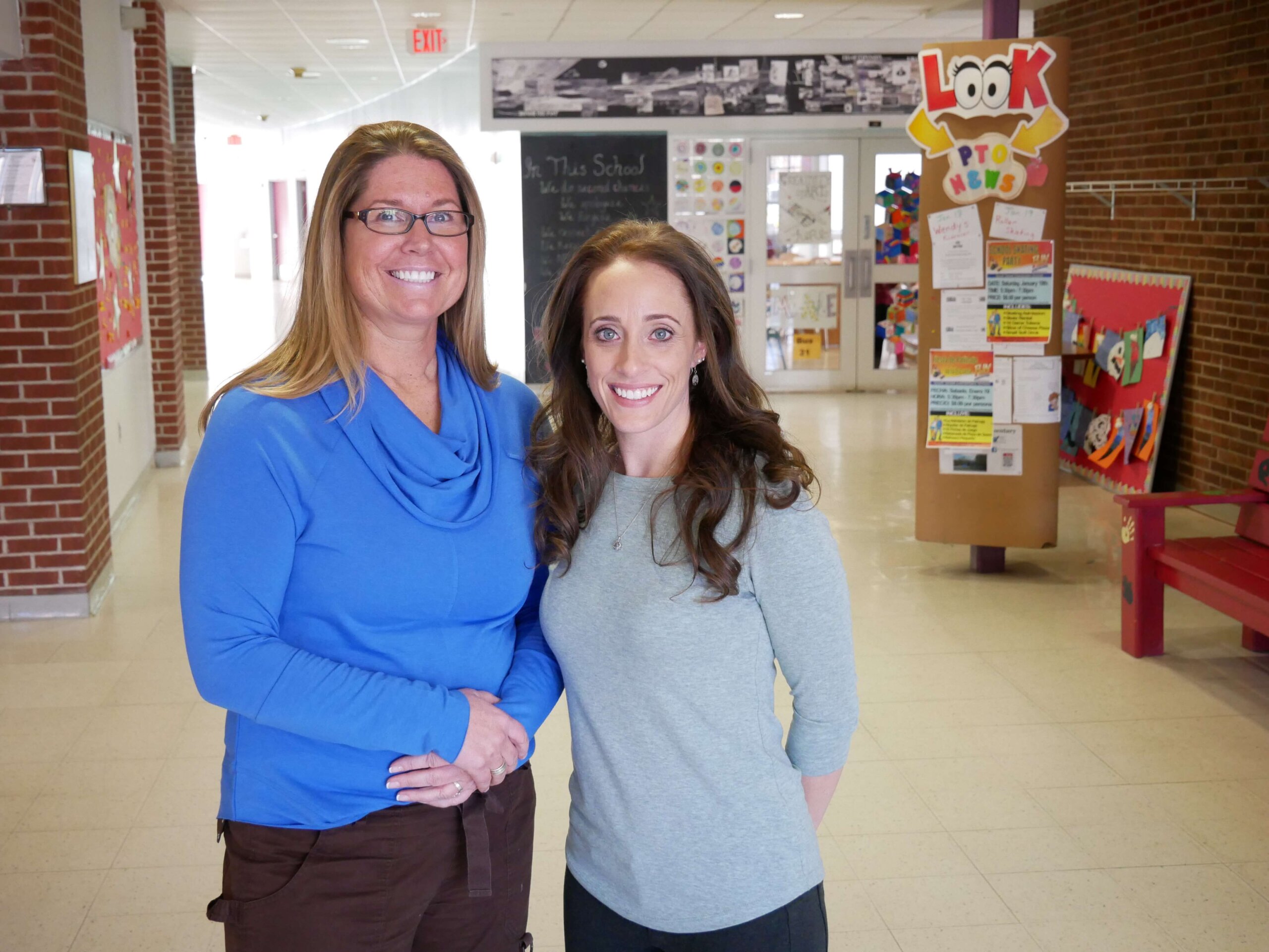 Photo of Molly Reid '19 and Debbie Duteua '19, students in the MSN in School Nursing program