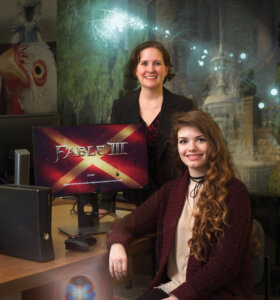 Photo of Associate Professor of Psychology Jen Rivers & Sarah Picard '18, a psychology major