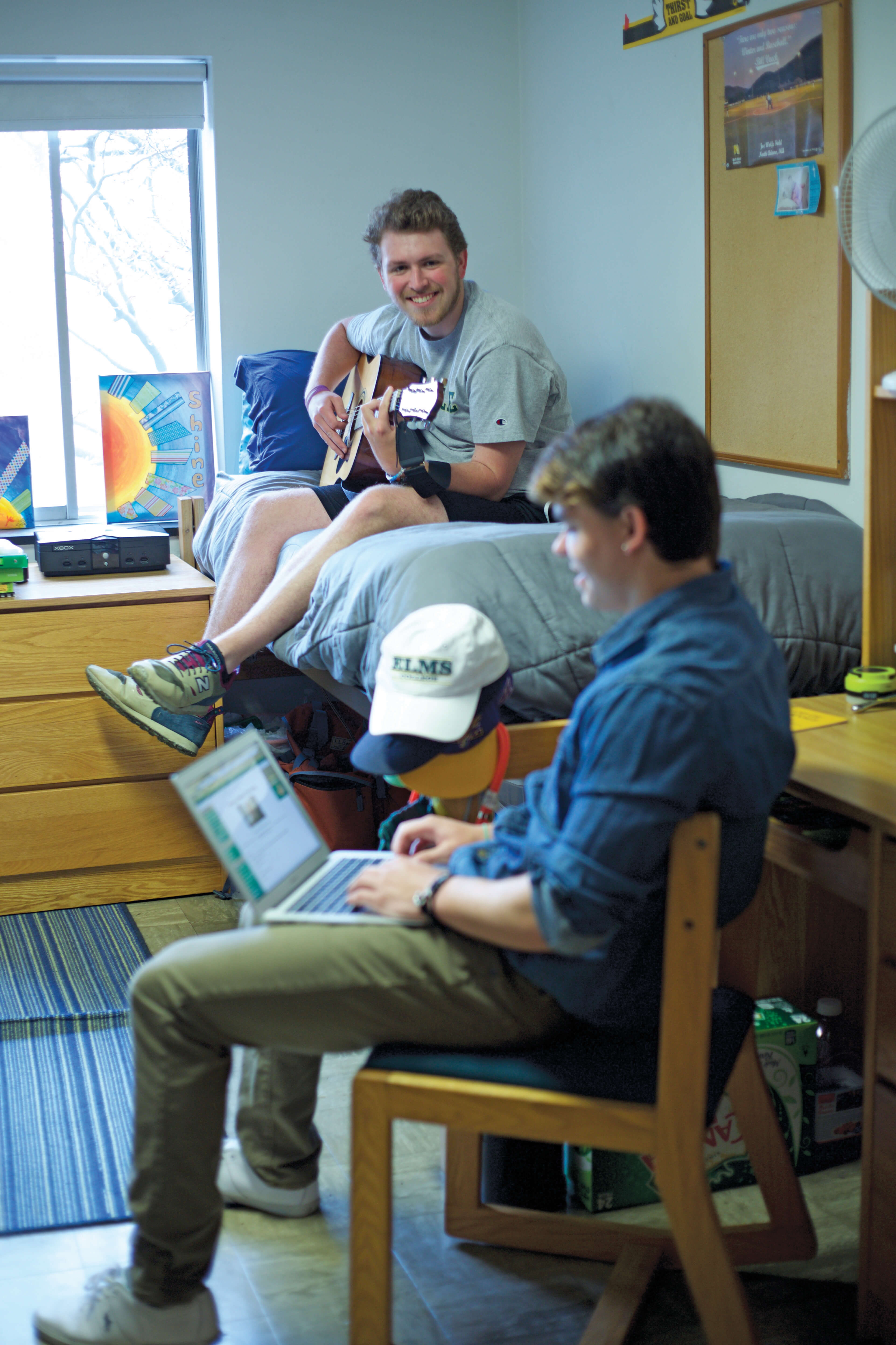 Photo of students in a dorm room in Rose William Hall