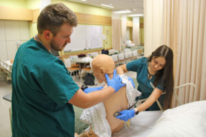 Photo of nursing students in the simulation lab
