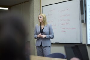 Photo of a professor teaching in classroom