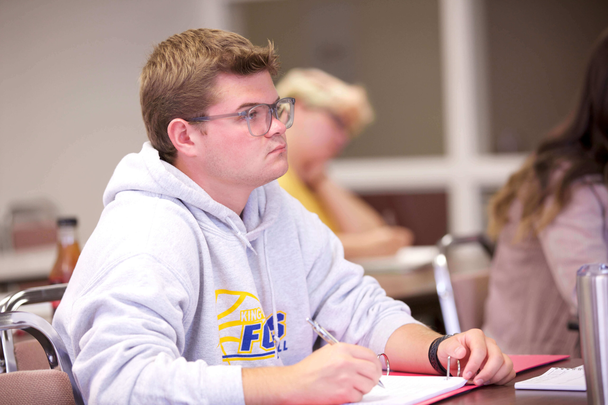 Photo of a student studying in class