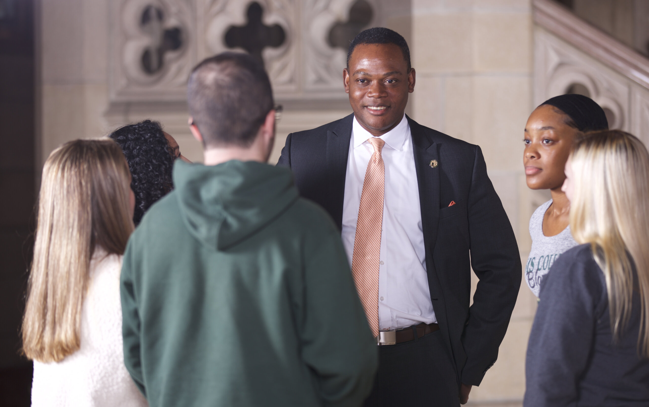 Photo of Dr. Dumay with students