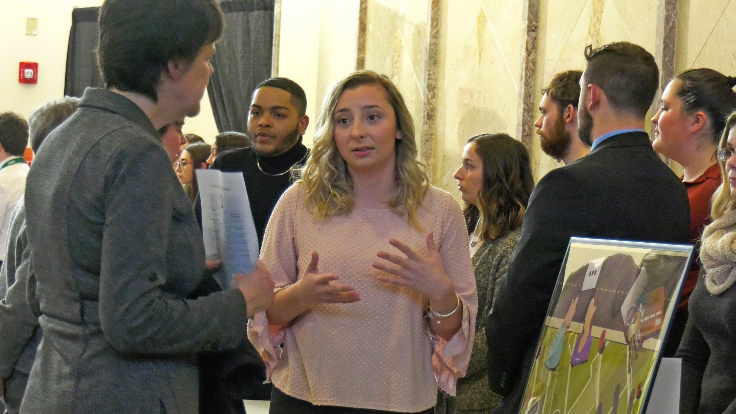 Photo of student presenting work