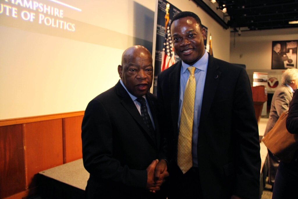 Dr. Dumay meeting Congressman Lewis at Saint Anselm College in October 2016.