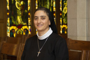 Photo of Sr. Raghida Antoun '20, MBA '22 in St. Joseph Chapel