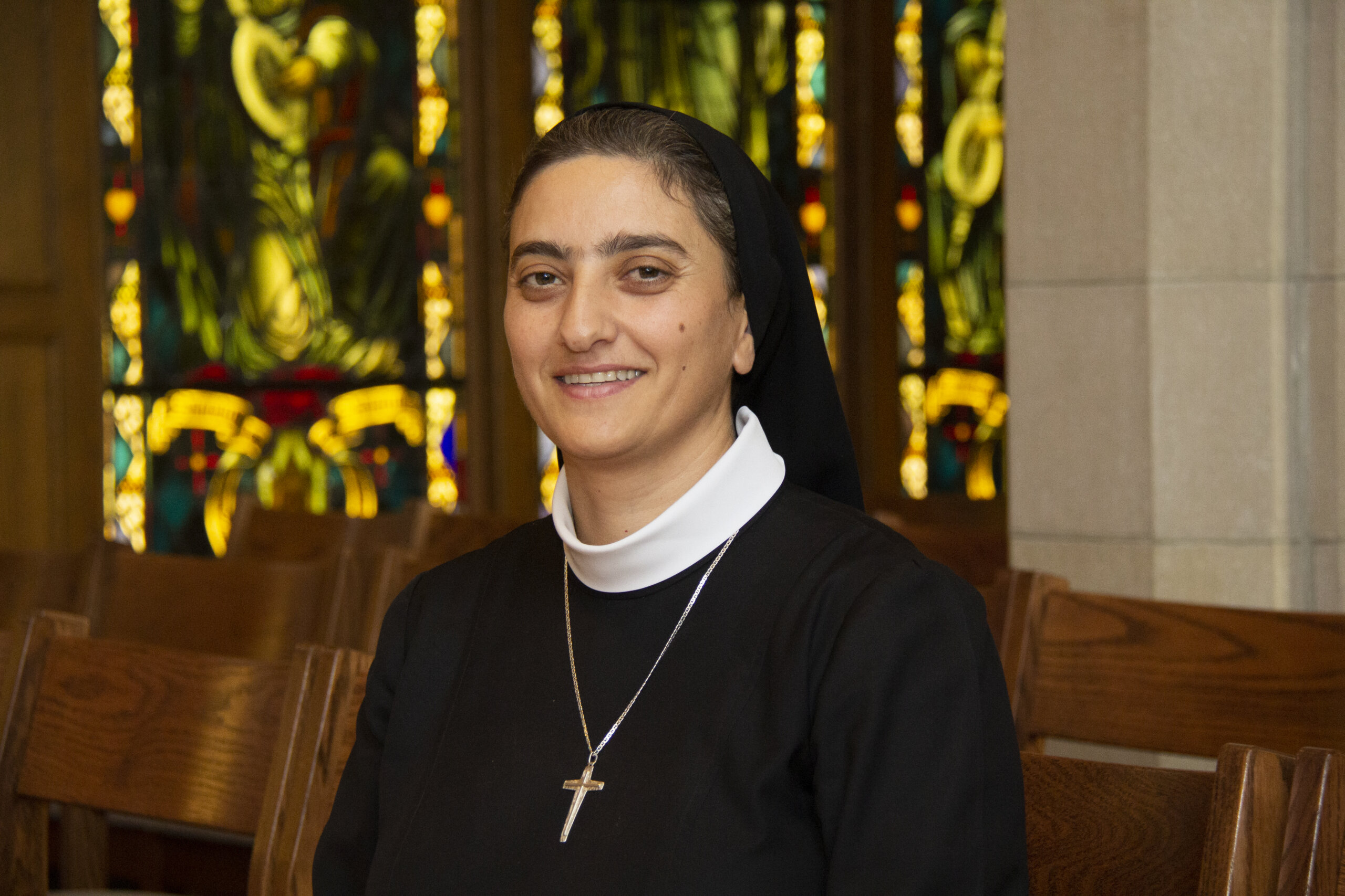 Photo of Sr. Raghida Antoun '20, MBA '22 in St. Joseph Chapel