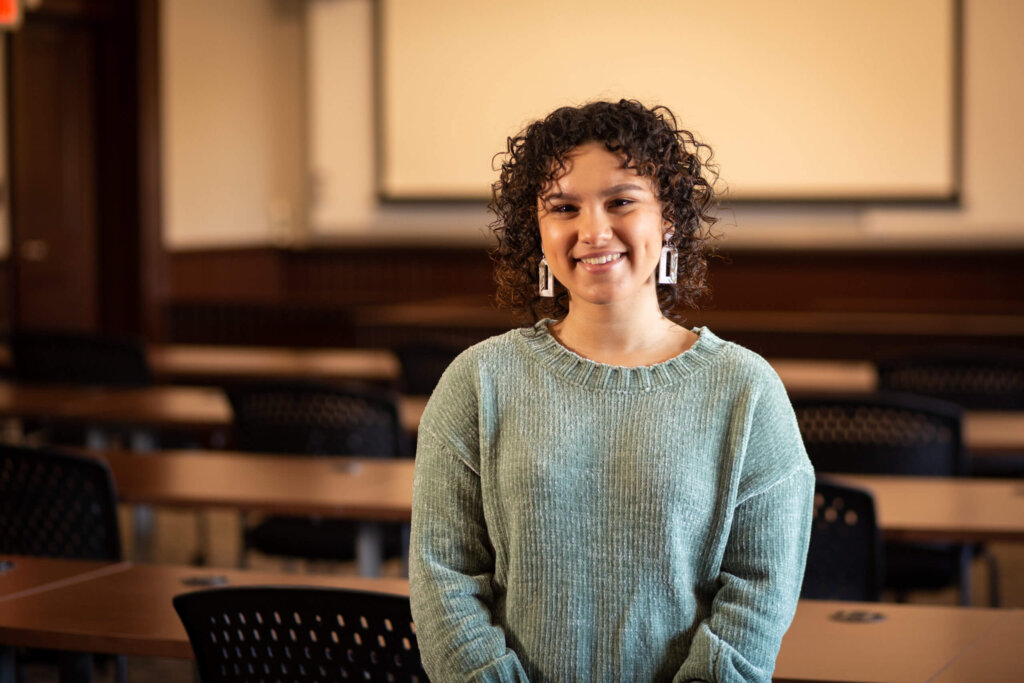 Photo of a student in a classroom; education major
