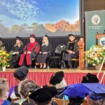 commencement, elms college, group of people on a stage