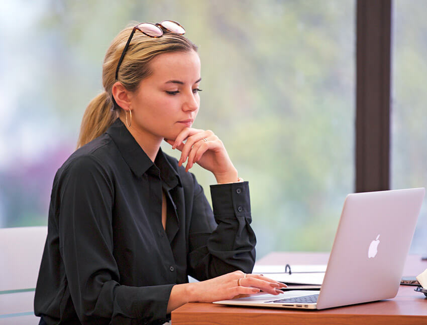 student, online learning, on a laptop