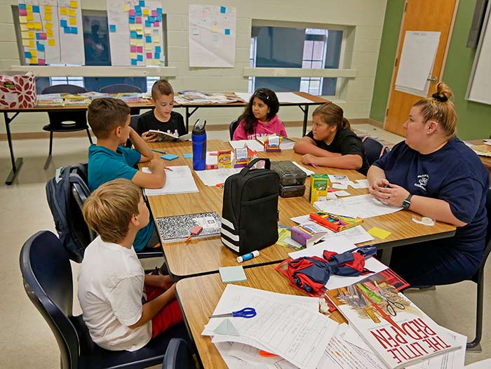 Teacher and students in a classroom