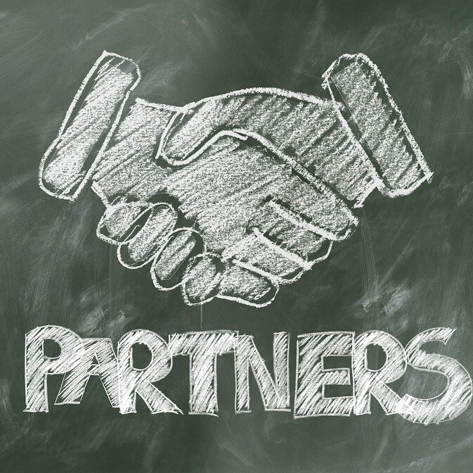 partners, shaking hands