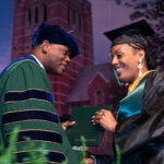 Photo of Dr. Dumay and a student on stage