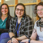 A photo of three students