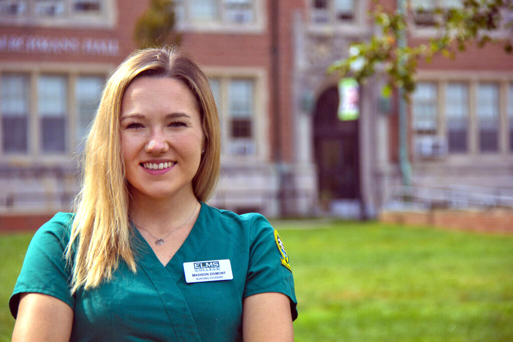 Photo of a nursing student on the quad