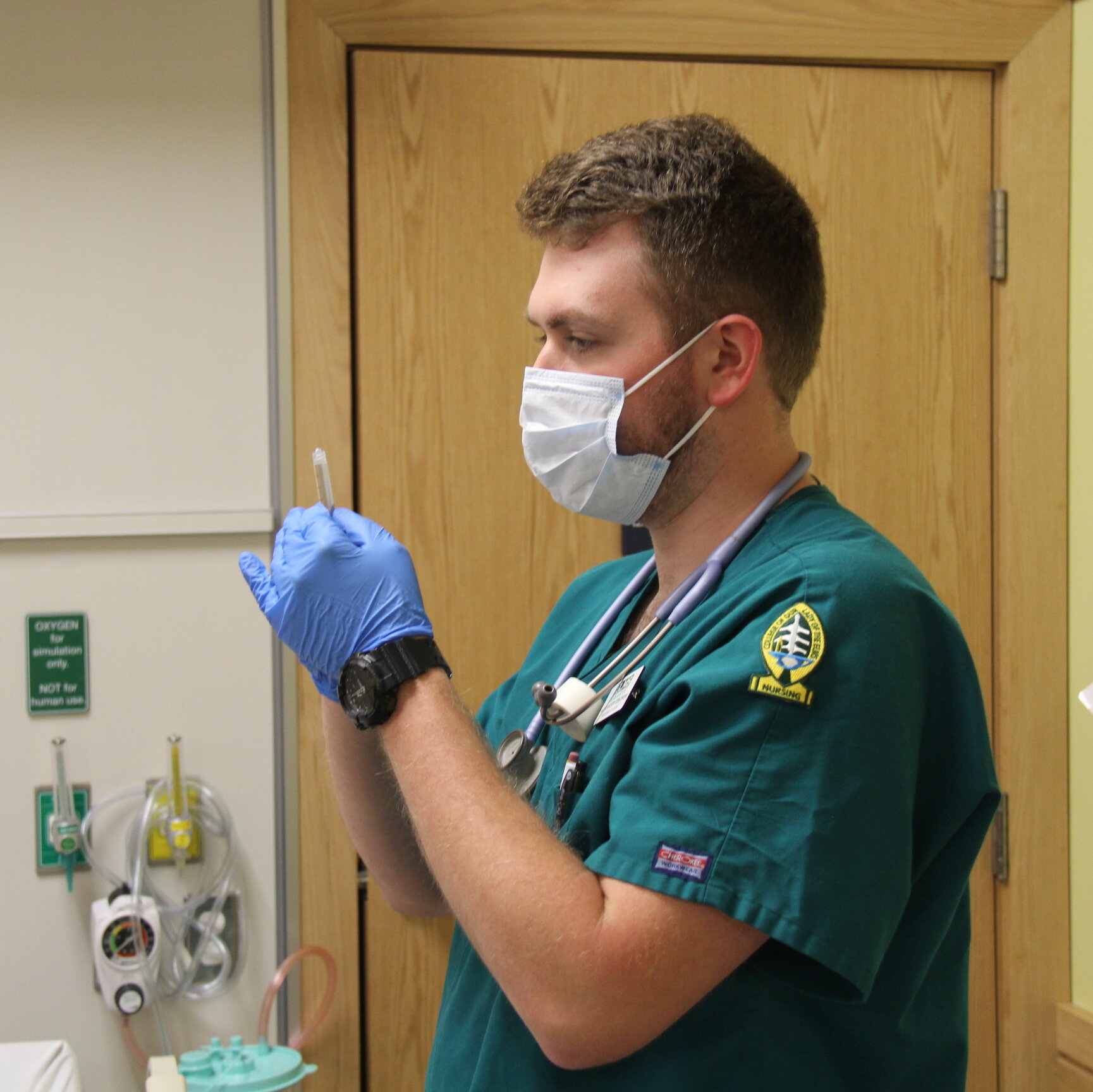 Photo of a nursing student in the skills lab