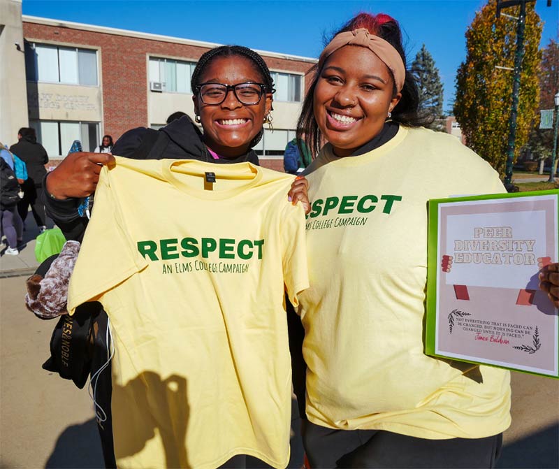 Photo of two women with RESPECT t-shirts