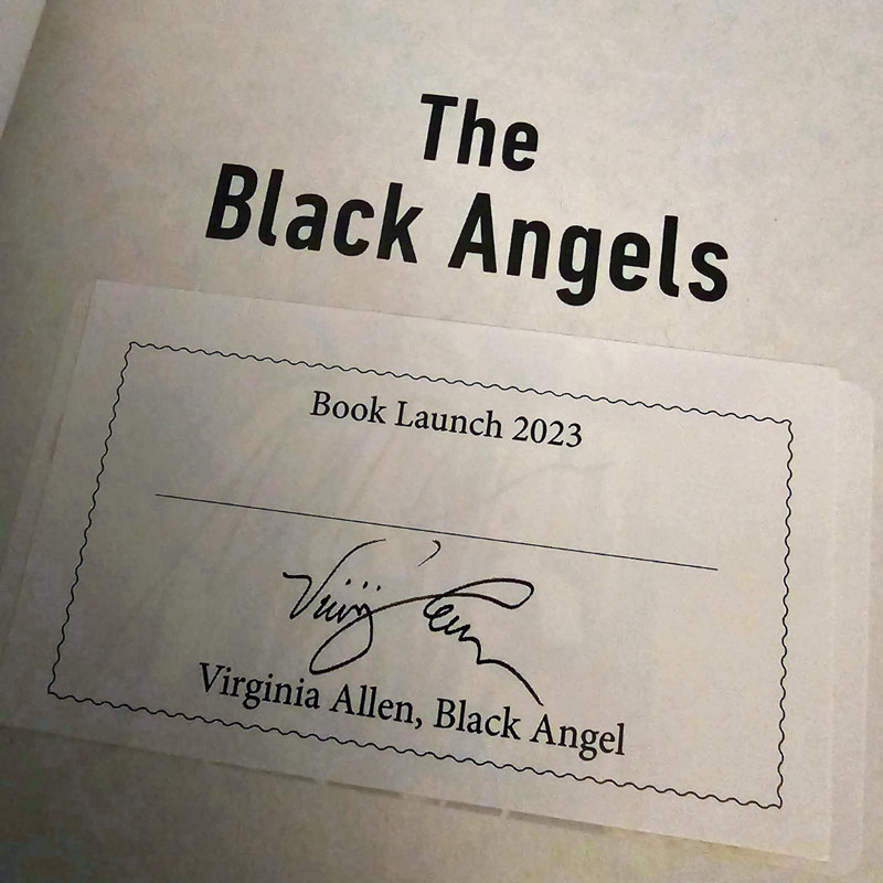 Photo of book inside page "The Black Angels" book launch