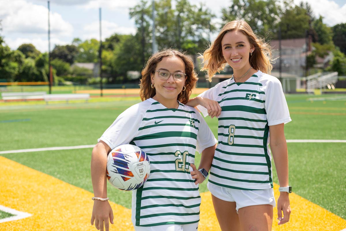 Photo of 2 female soccer players