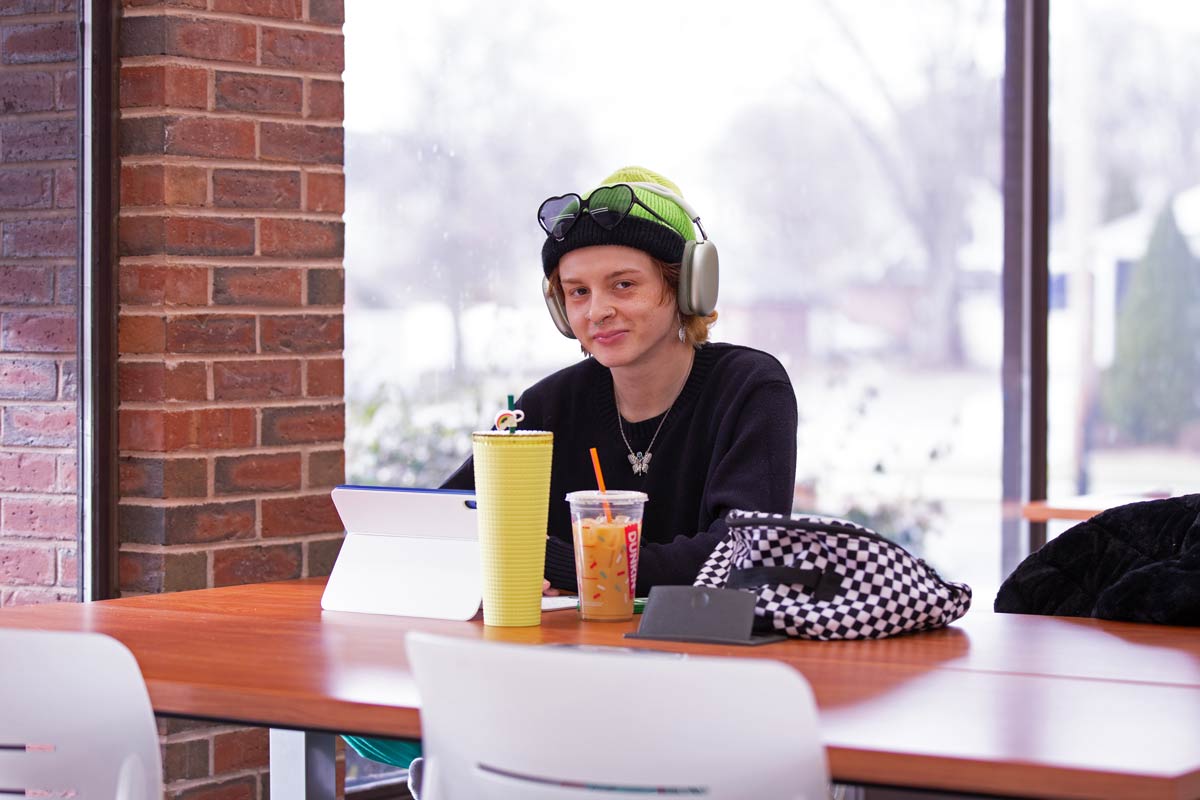 Photo of a student in the library