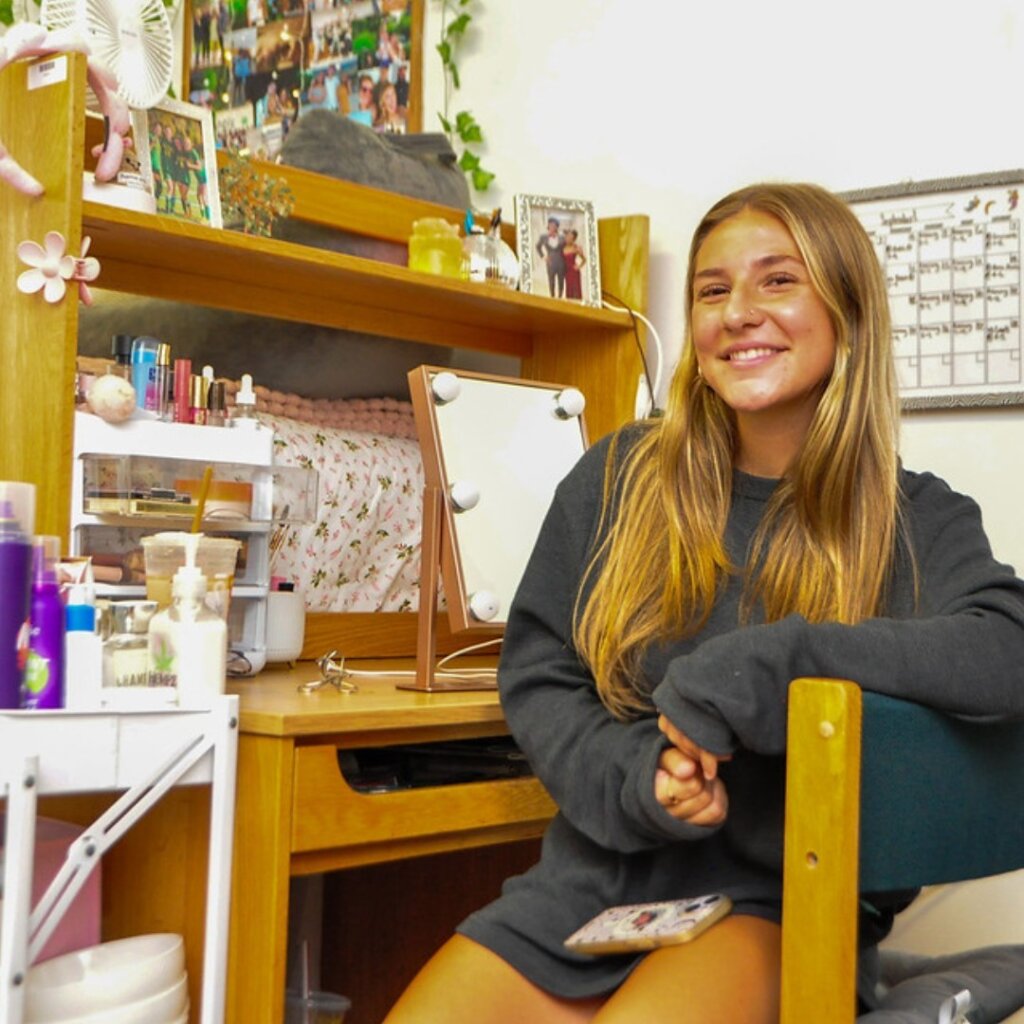 Photo of a student in dorm room