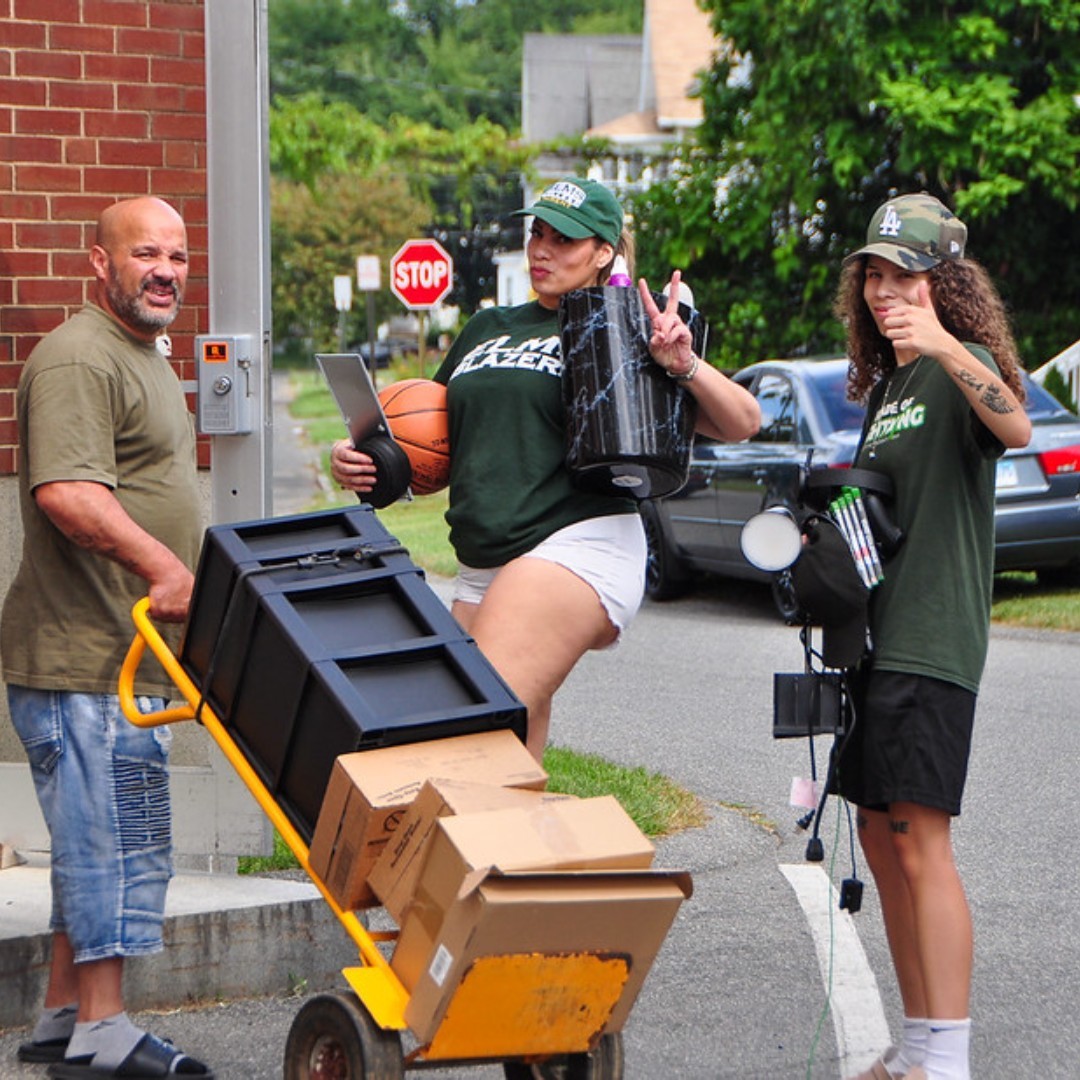 Photo of a students moving in