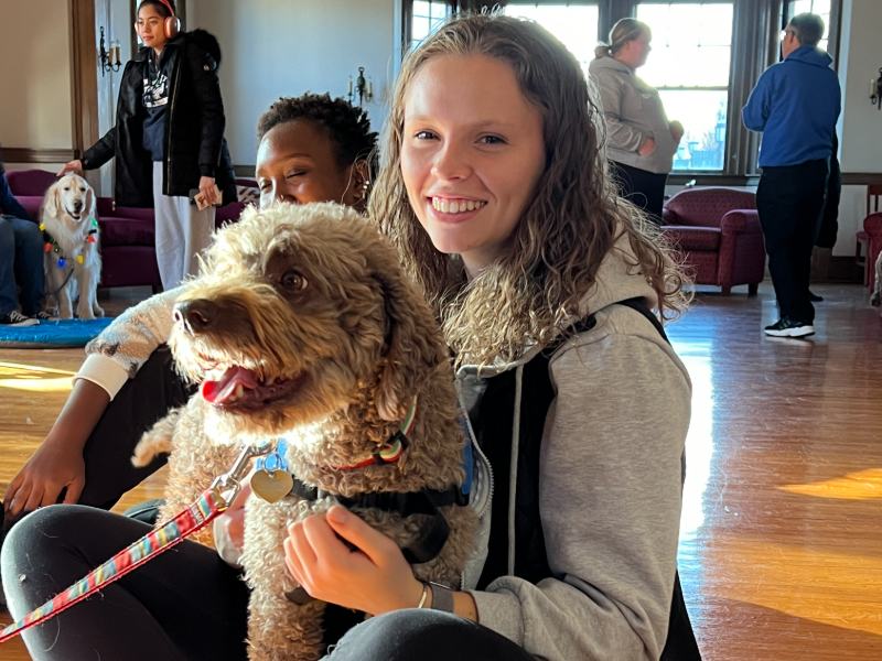 Photo of a woman with a dog