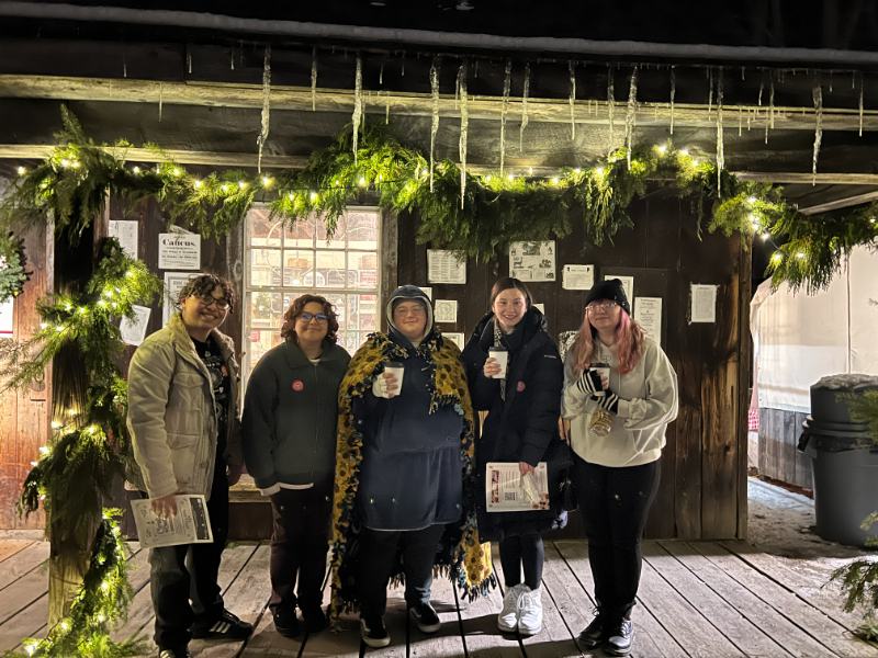 Photo of five students outside