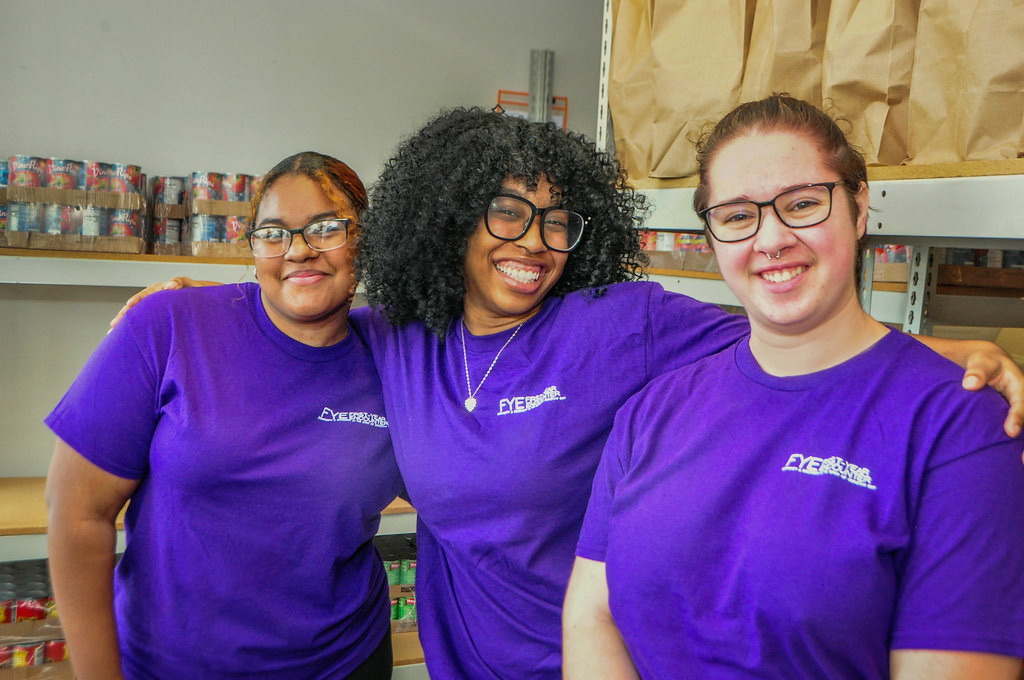 Photo of three women in a food panty