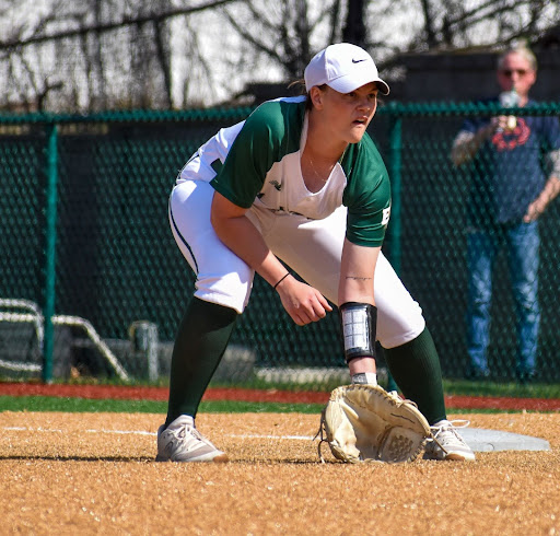 Photo of Katie Cosmos playing baseball