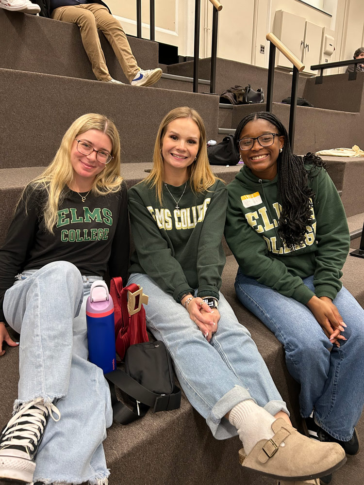 Photo of 3 students in a building