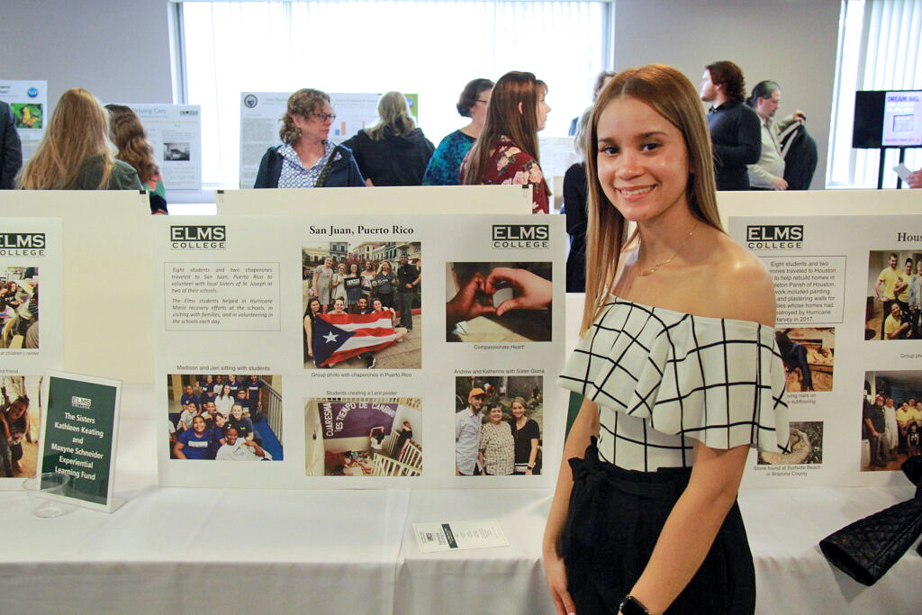 Photo of a Student at a experiential learning showcase