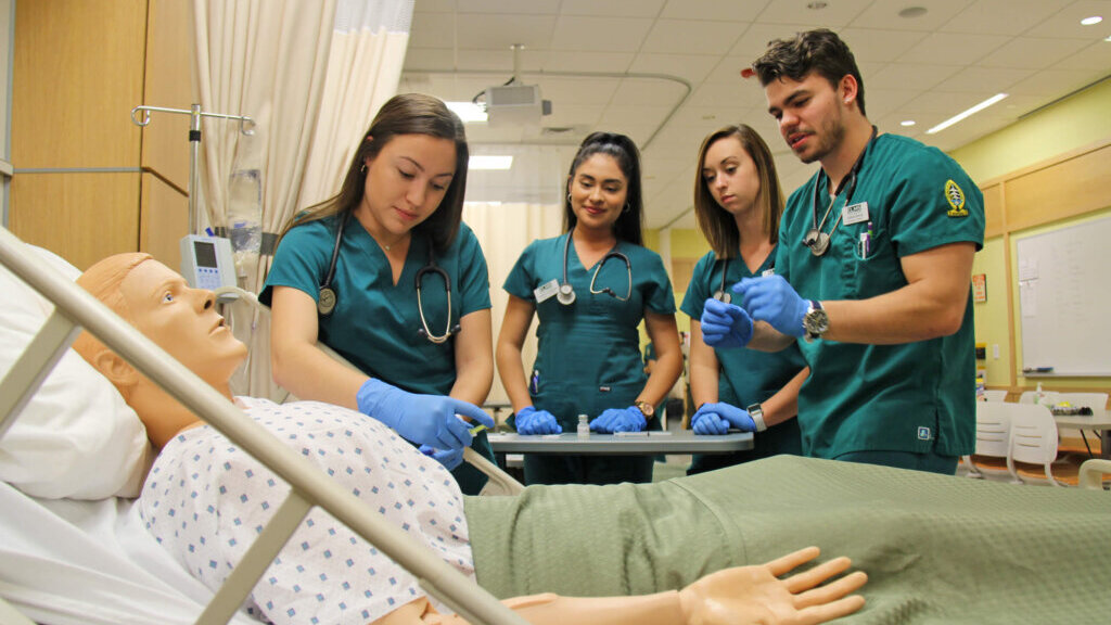 4 nurses in a sim lab